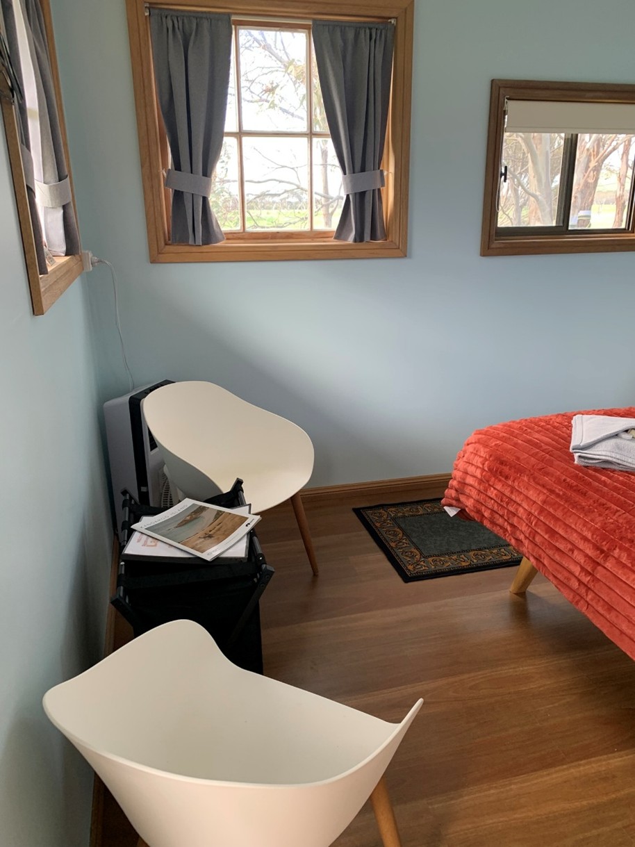 Eco Cabin B seating area & suitcase stand